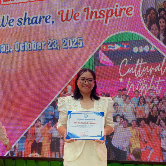 posing with my certificate